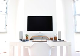 Apple, chair, computer — 15.36TB vs. 30.72TB SSD: Which One Fits Your Business Needs?