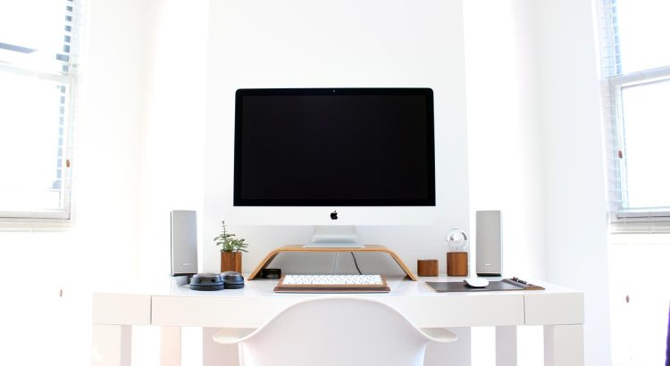 Apple, chair, computer — 15.36TB vs. 30.72TB SSD: Which One Fits Your Business Needs?