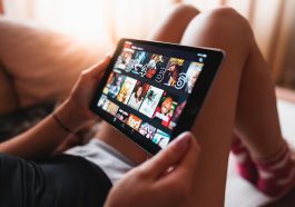 Tablet, girl, netflix — The Advantages of Watching Live Games Through Sports Broadcasting
